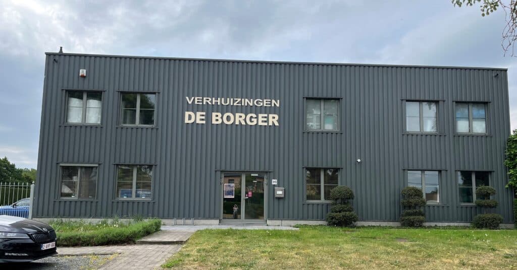 Professional storage facility showcasing organized warehouse with storage containers